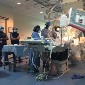 Dr. Ratnayaka and Dr. Rawlinson observing UHI cath team.