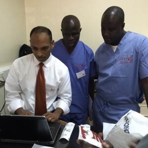 WCI's Dr. Ratnayaka, UHI's Dr. Lubega, UHI's cath tech Daudi Kirenza