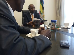 Ugandan Prime Minister reviewing WCI Annual Report